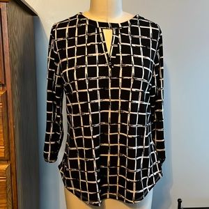 Cute. black & cream colored shirt